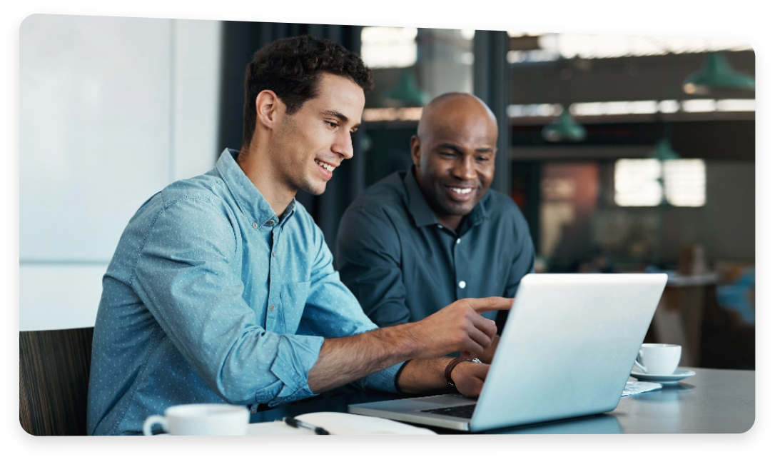 Man showing notebook to his partner
